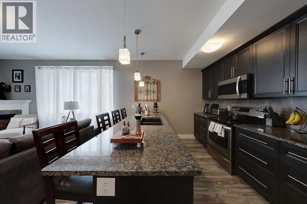 #103 605 6 Avenue SE - 3