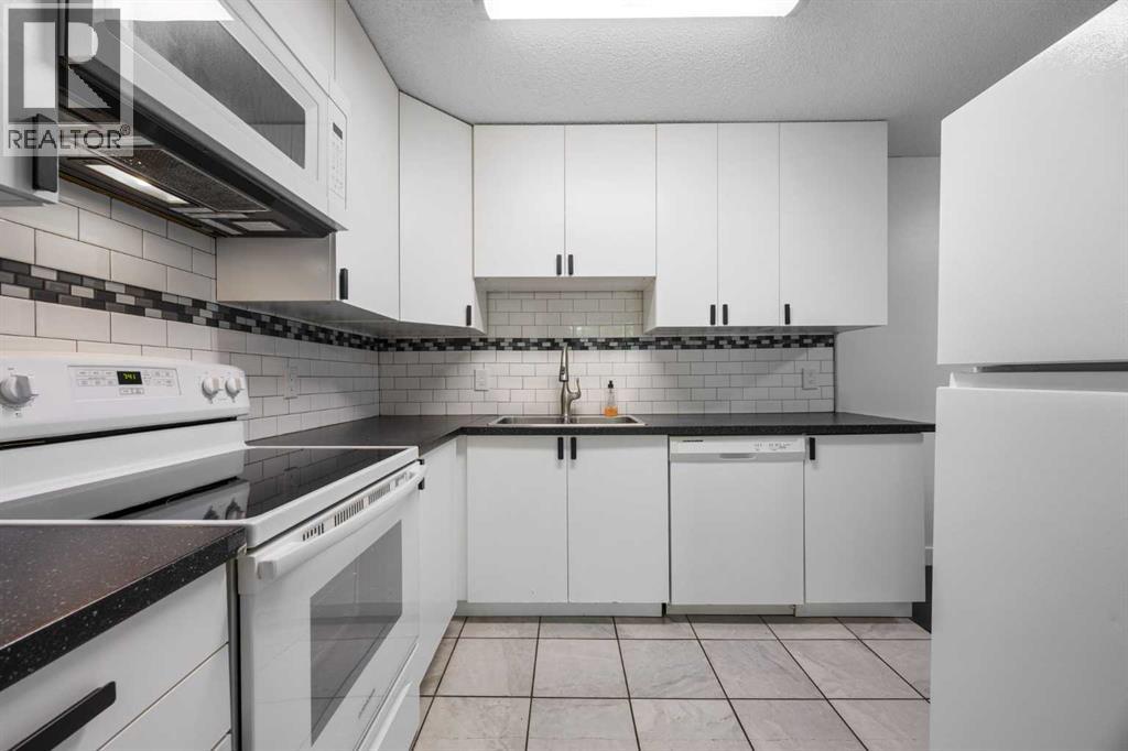 #301 1540 29 Street NW - 27