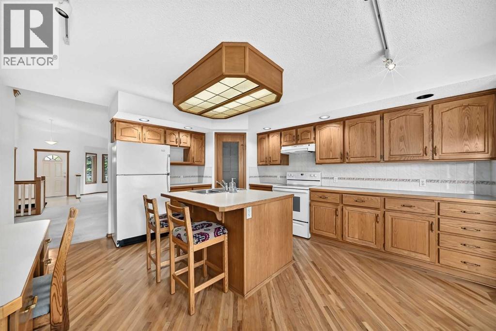 Another look at the heart of the home, showcasing the generous storage and clever built-in desk area