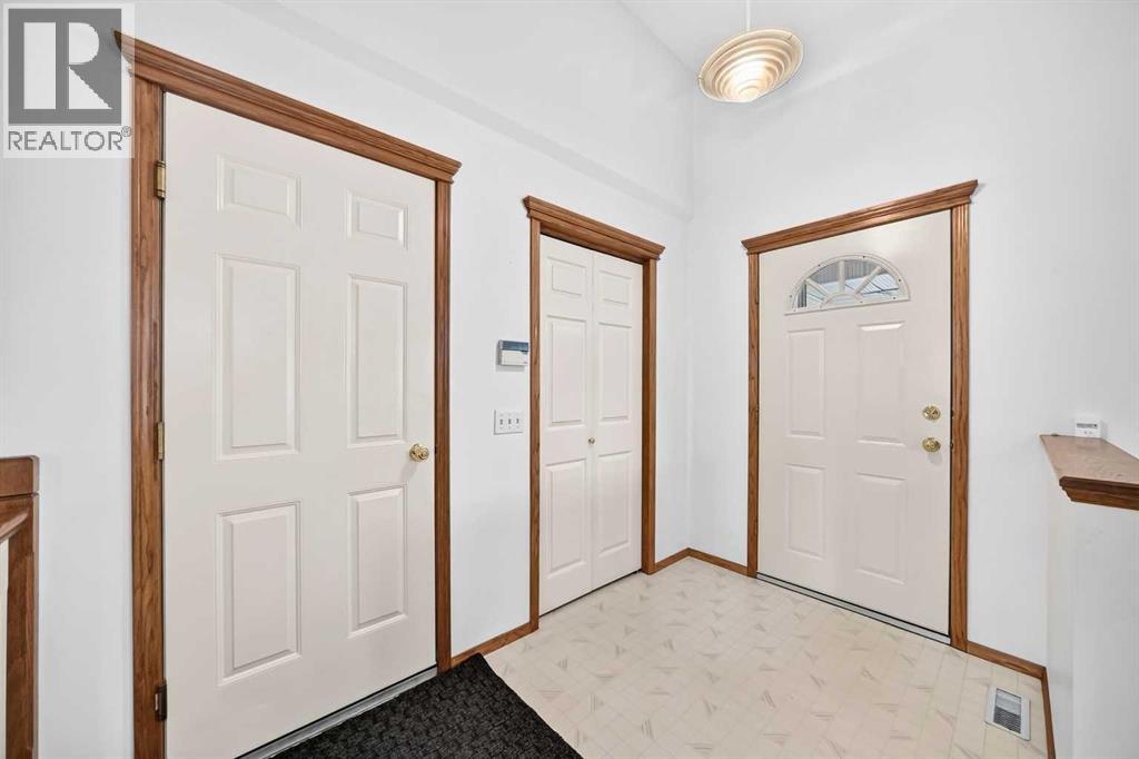 Looking back toward the foyer, where the left-hand door opens to the attached two-car garage