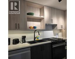 406 1100 Clarke Road, Port Moody, BC V3H0N3 Photo 6