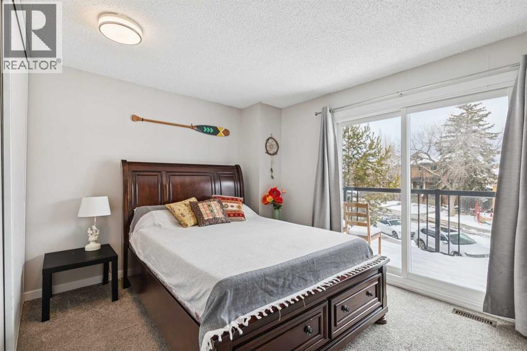 Primary bedroom with private balcony
