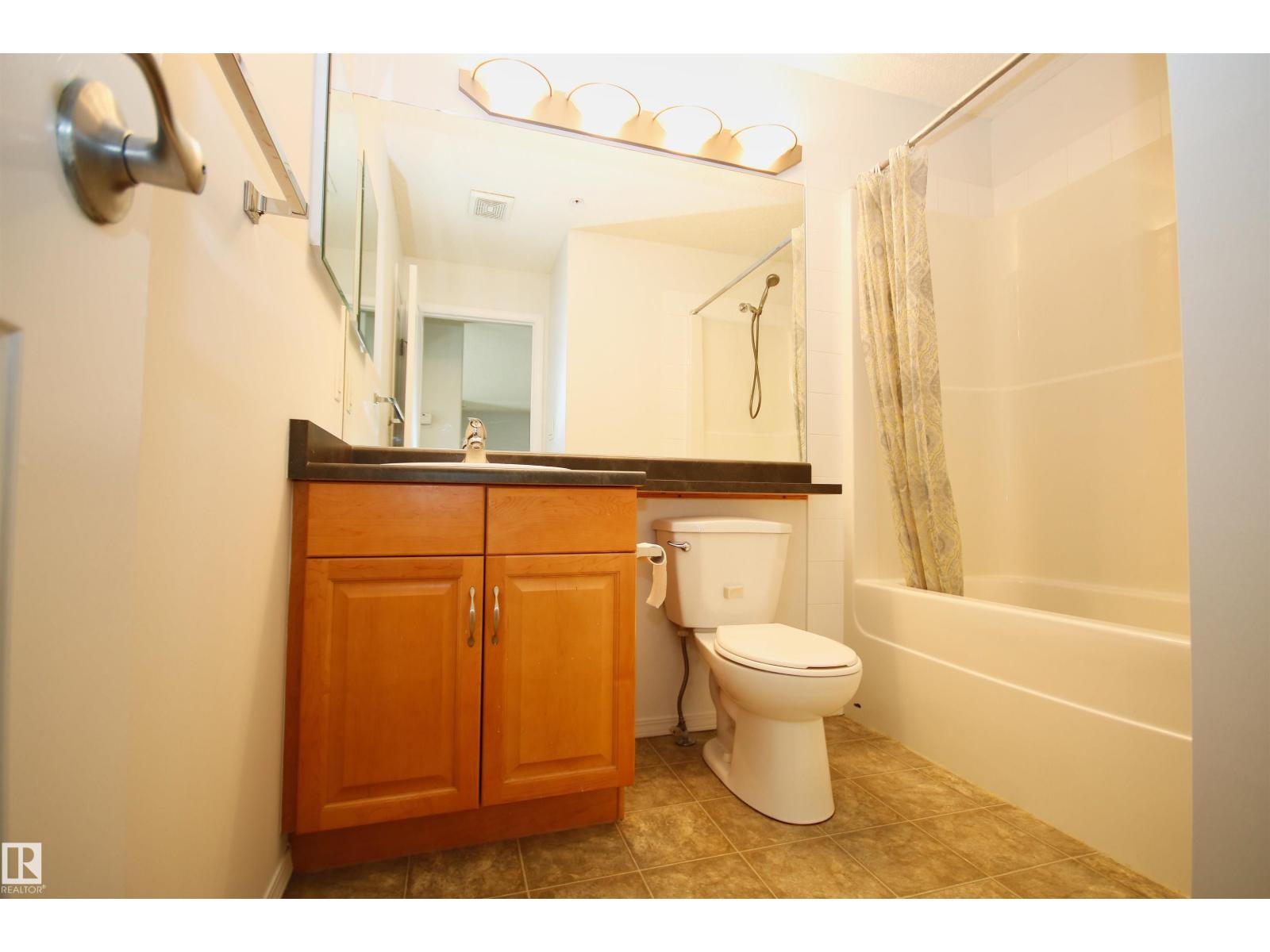 #311 2098 BLACKMUD CREEK DR SW — photo 18