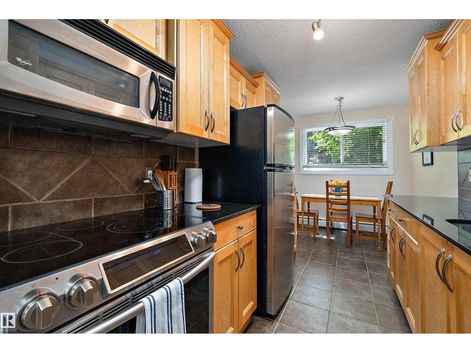 #103 10720 84 AV NW — photo 18