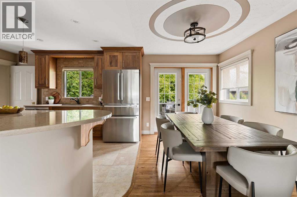 Dining room off kitchen leading to your beautiful backyard