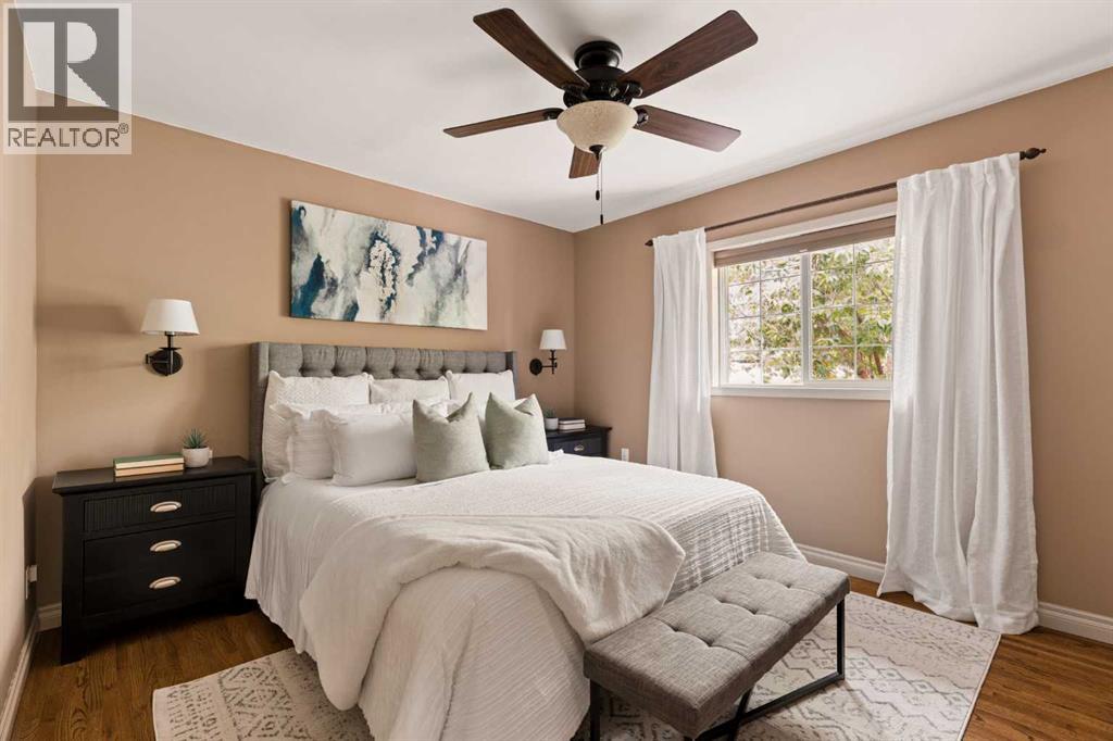 Primary bed overlooking the stunning yard