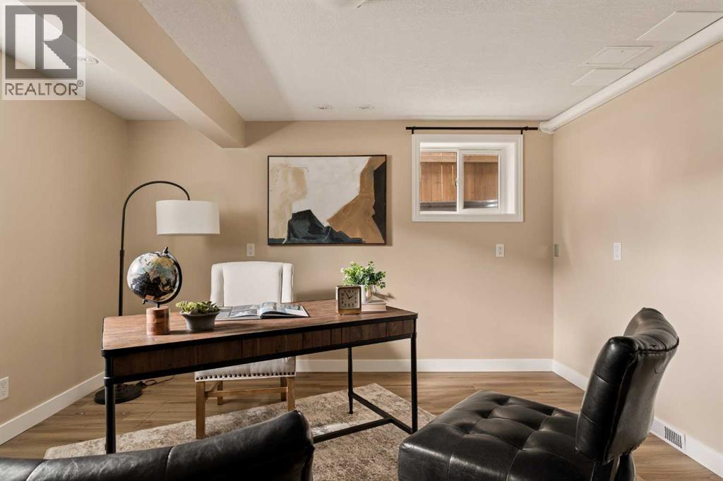 Versatile basement space with room for an office!