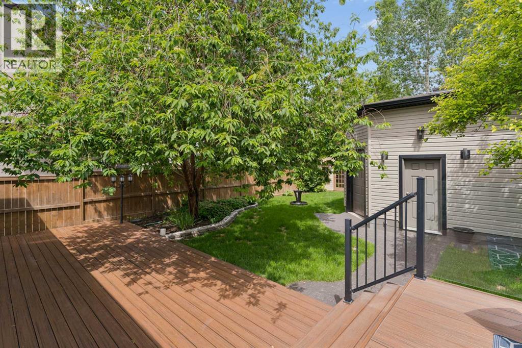 Steps off deck leading to garage