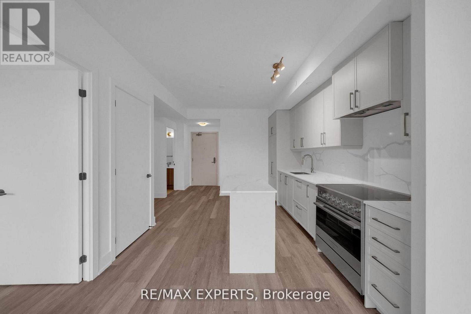 #203 2075 KING ROAD - 7