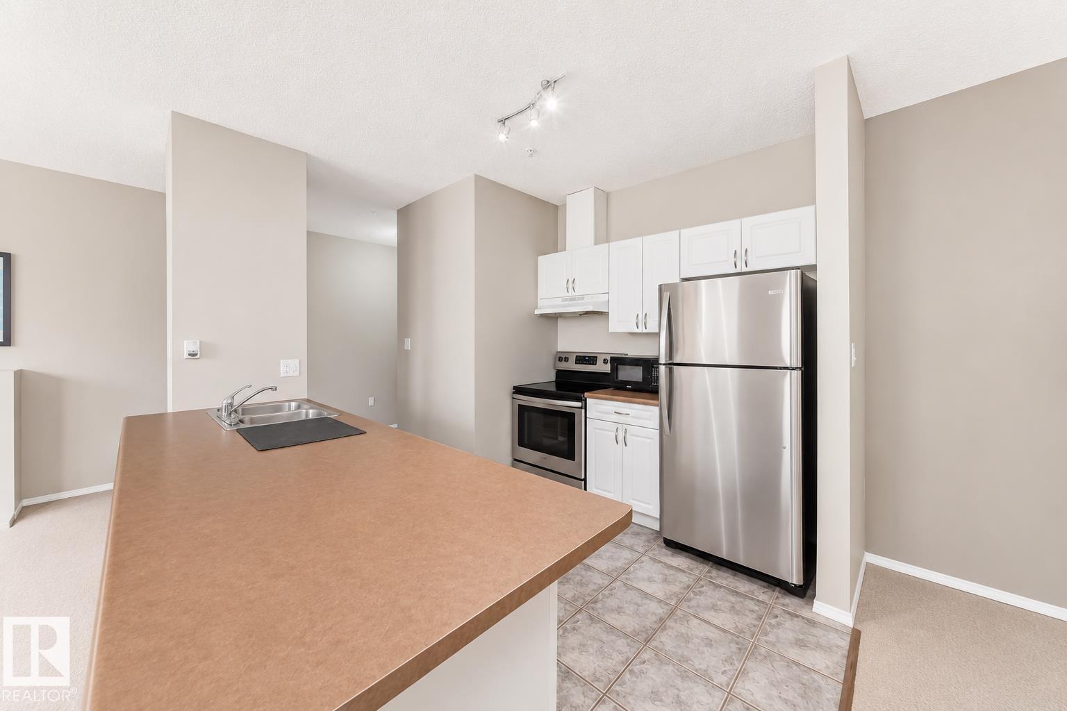 #601 9919 105 ST NW - 8