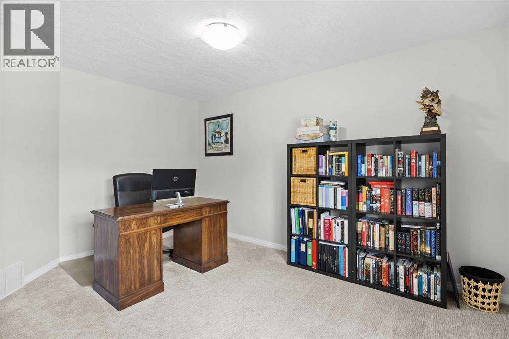 A versatile upstairs bedroom currently used as a home office