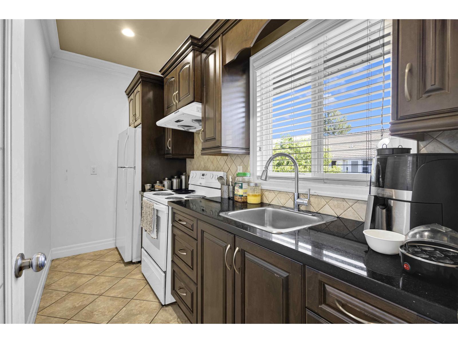 12420 90A AVENUE, Surrey