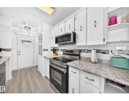 Laundry room - 13317 47 St Nw, Edmonton, AB T5A3L5 Photo 9