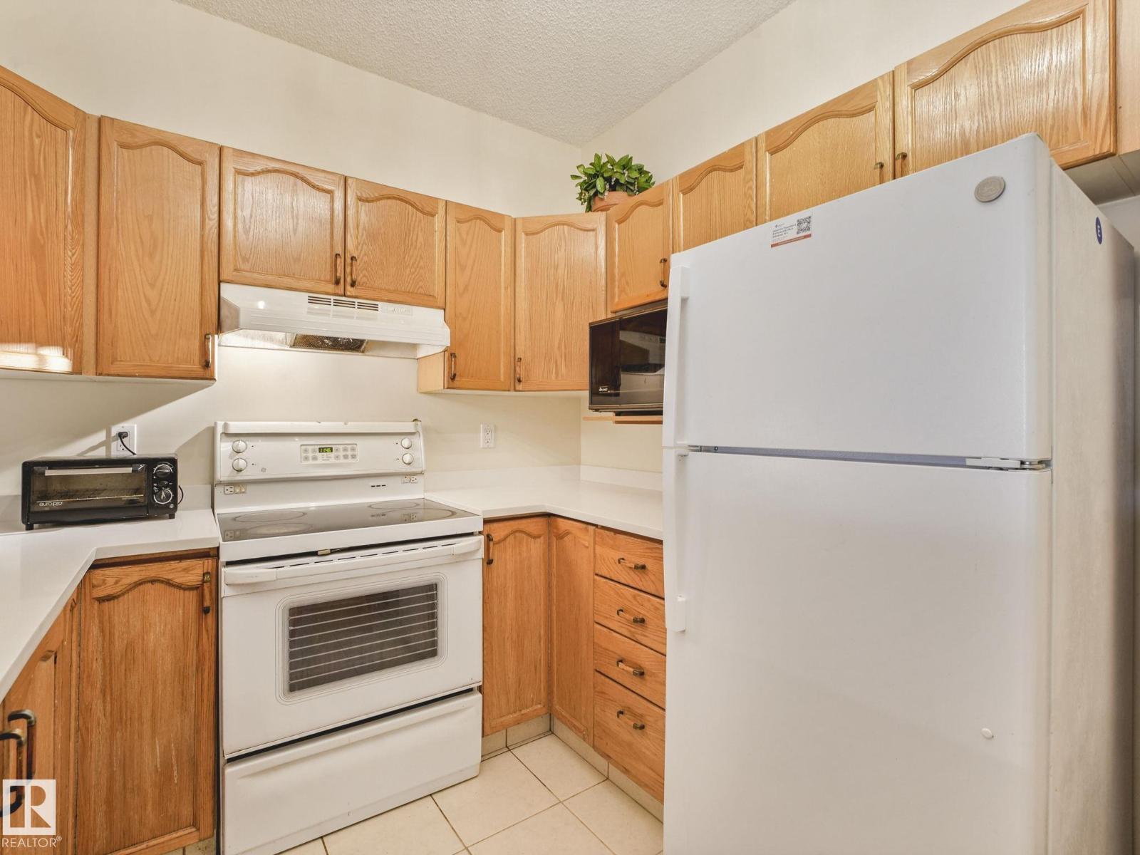 #330 15499 CASTLE DOWNS RD NW — photo 19