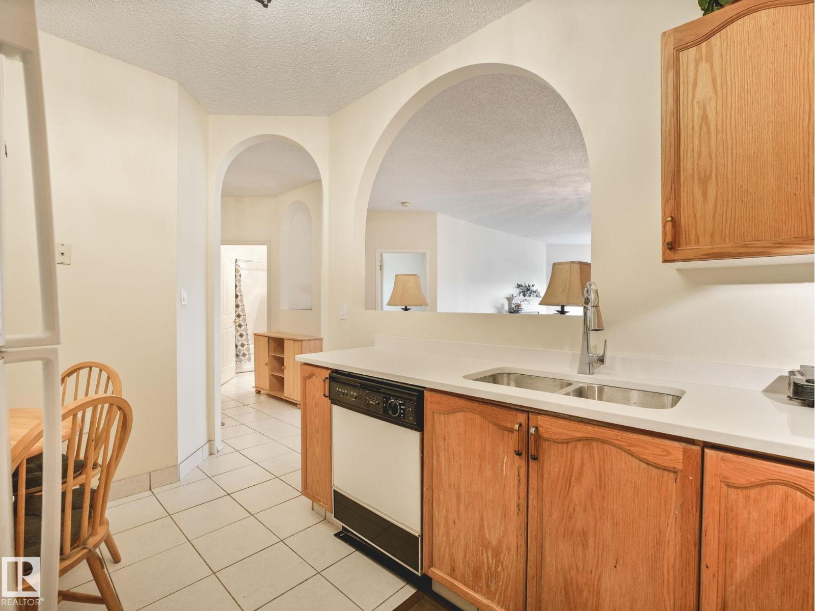 #330 15499 CASTLE DOWNS RD NW — photo 21