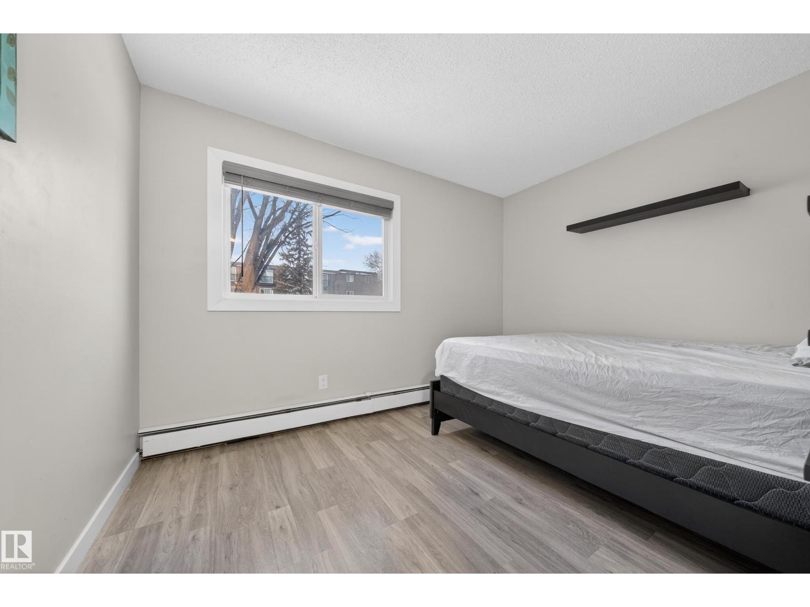 #202 10615 156 ST NW - 12