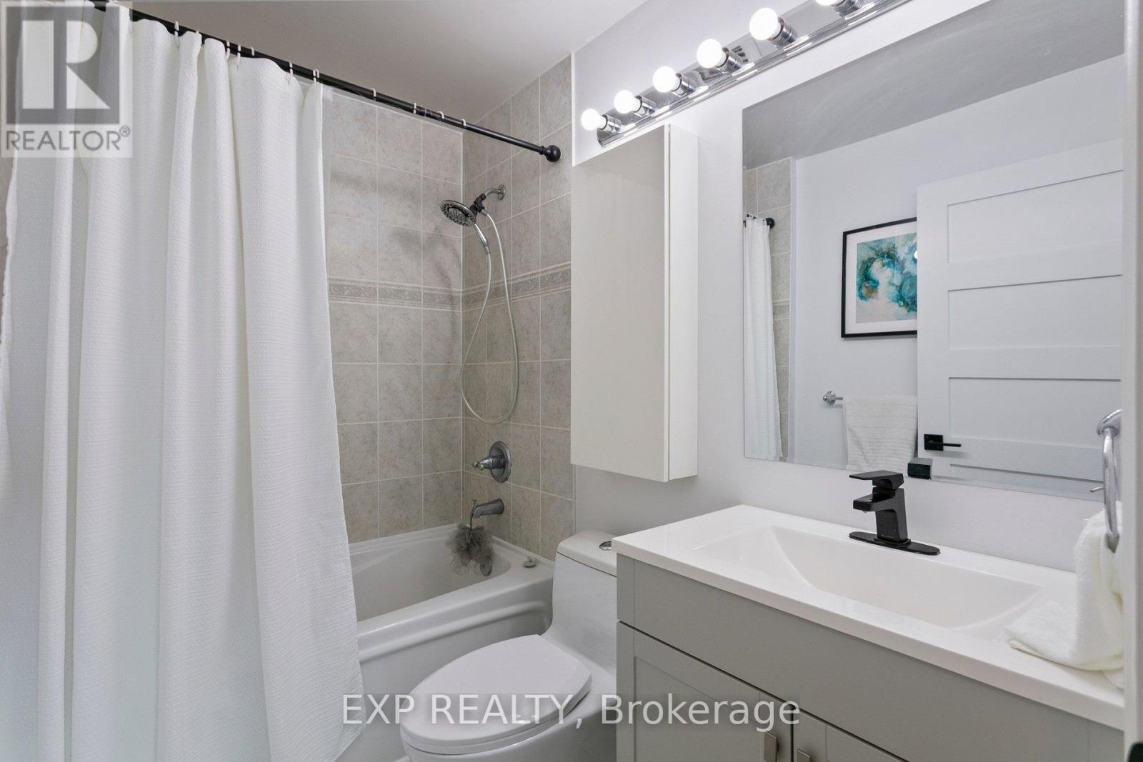 #1406 1359 RATHBURN ROAD E - 19
