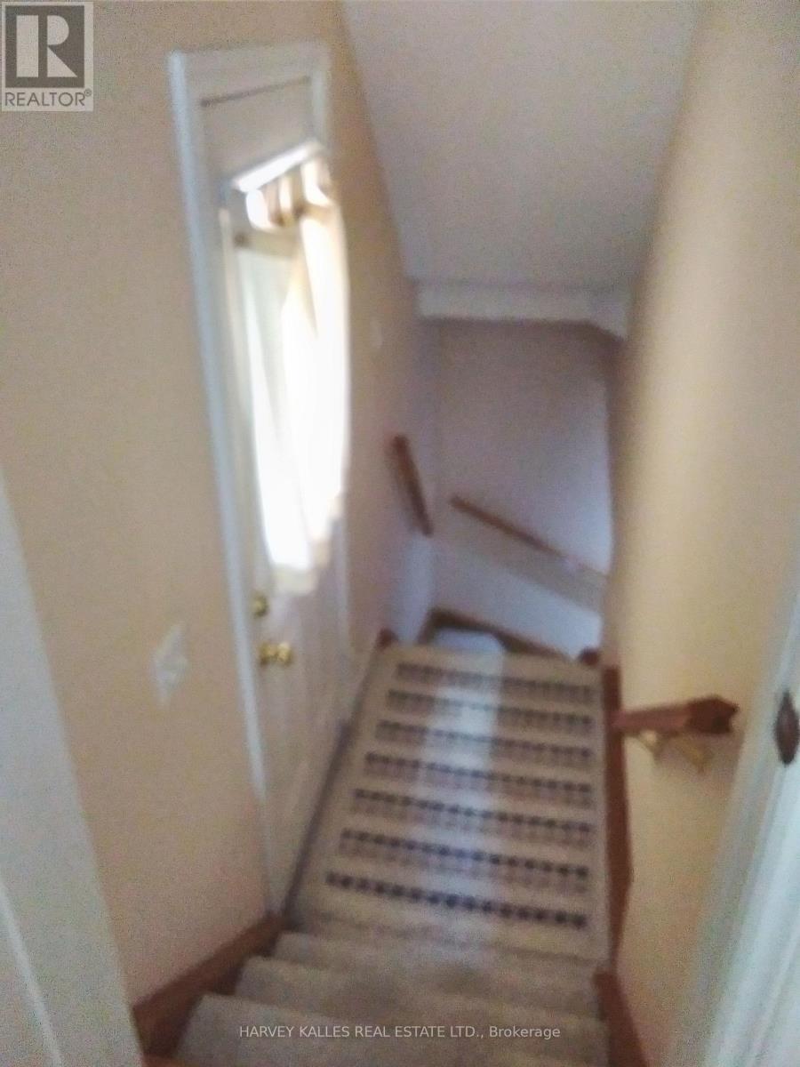 Side Door Entrance to Main Floor and Lower Level