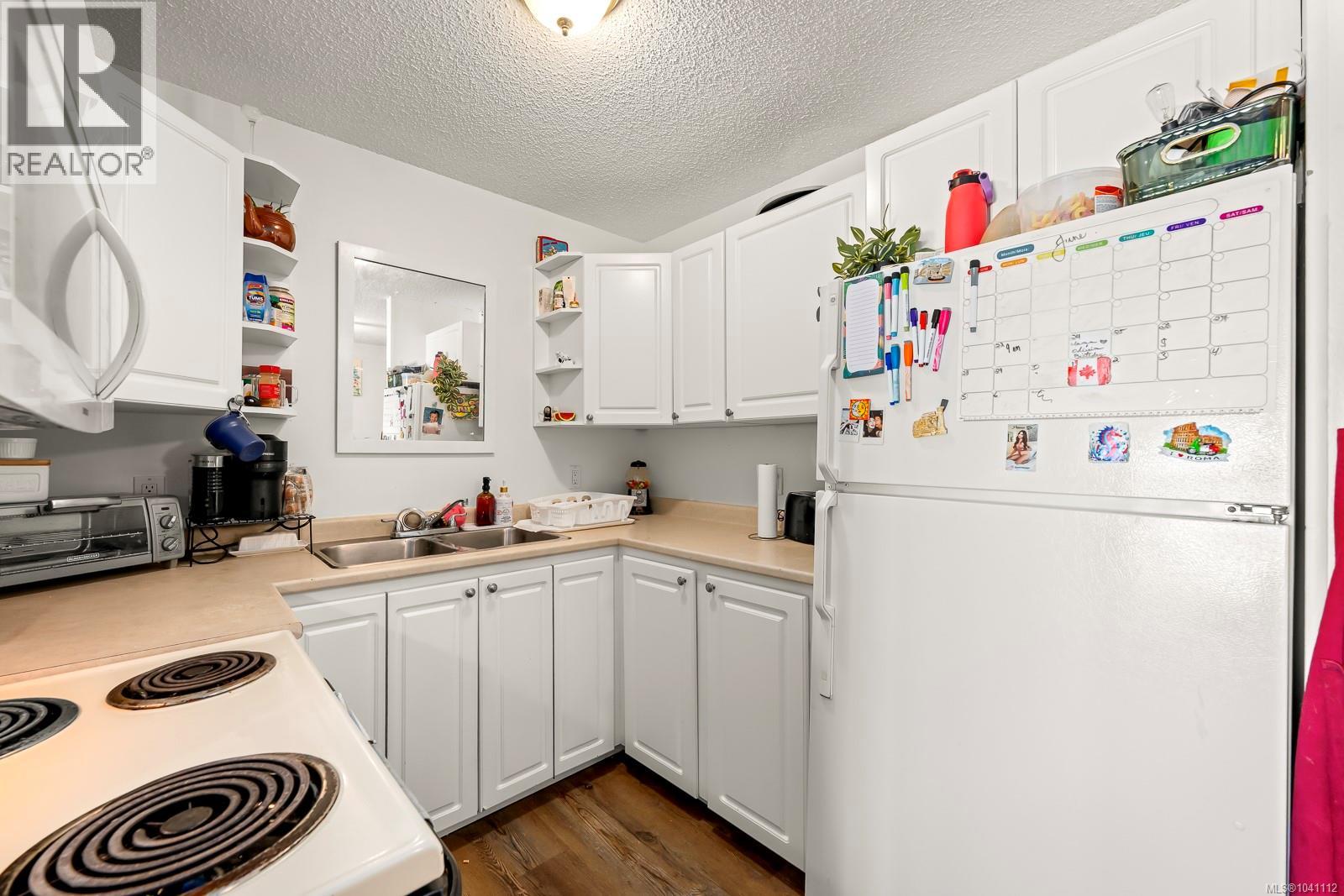 #301 1130 Willemar Ave - 14