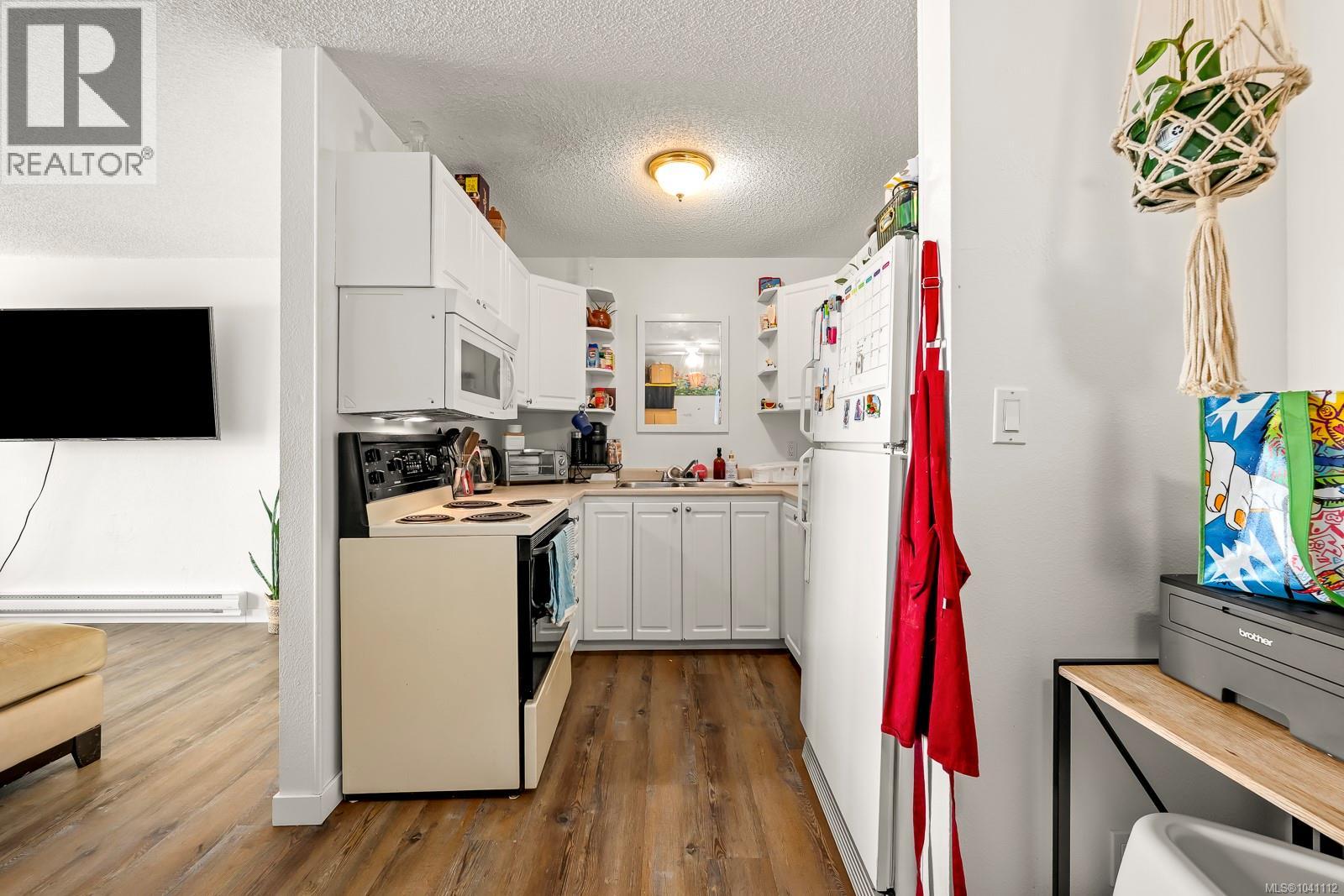#301 1130 Willemar Ave - 3