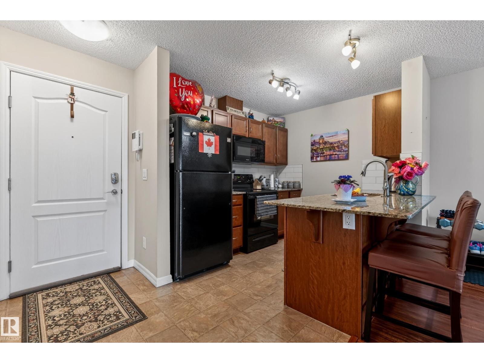 #419 271 CHARLOTTE WY - 4