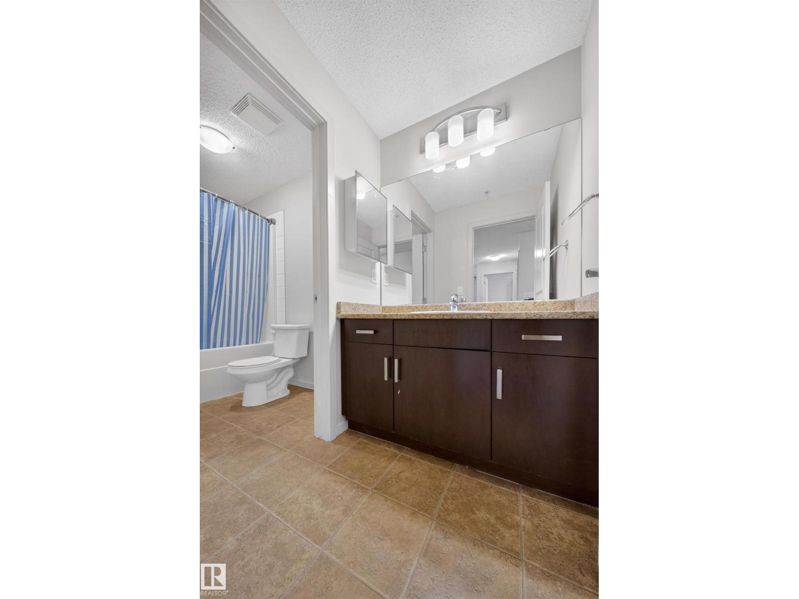 228 5515 7 Ave SW - 28