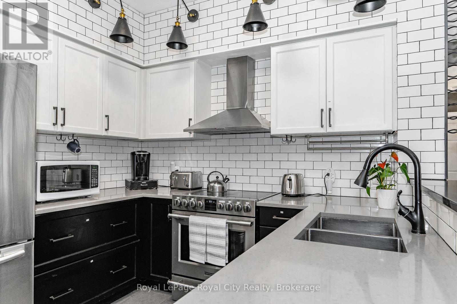 #102 308 WATSON PARKWAY N - 1