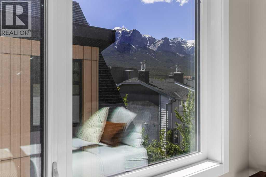 #104 1106 Bow Valley Trail - 30