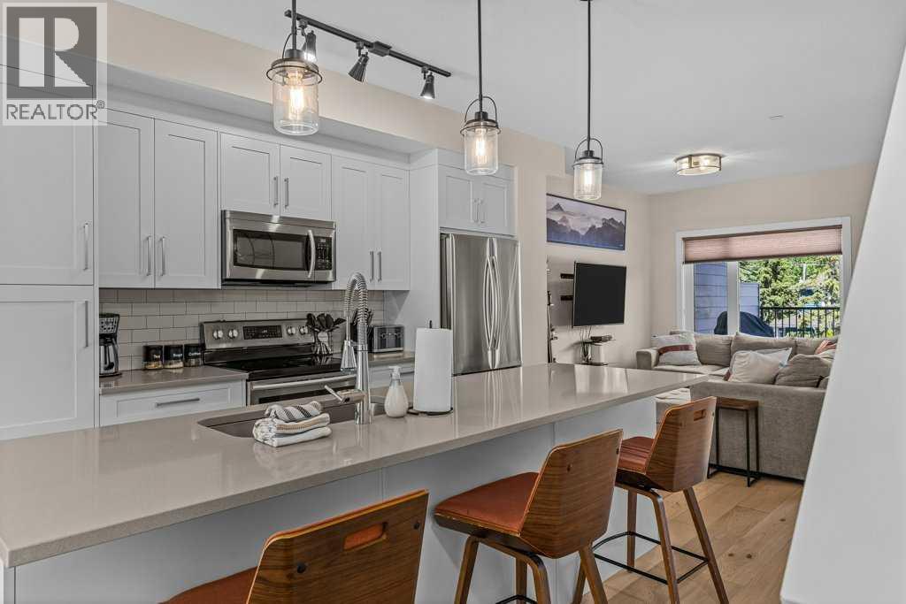 #104 1106 Bow Valley Trail - 21