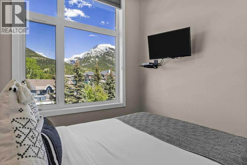 #104 1106 Bow Valley Trail - 23