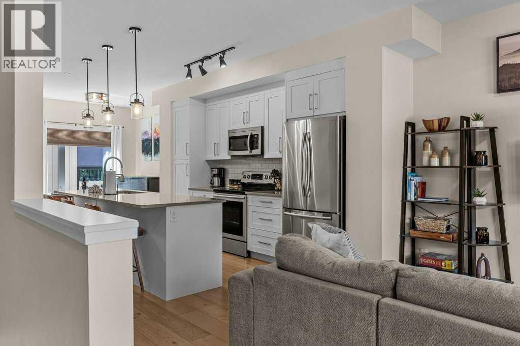 #104 1106 Bow Valley Trail - 2