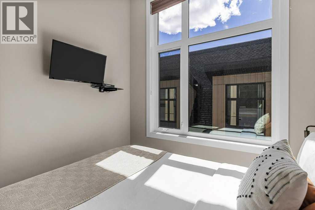 #104 1106 Bow Valley Trail - 28
