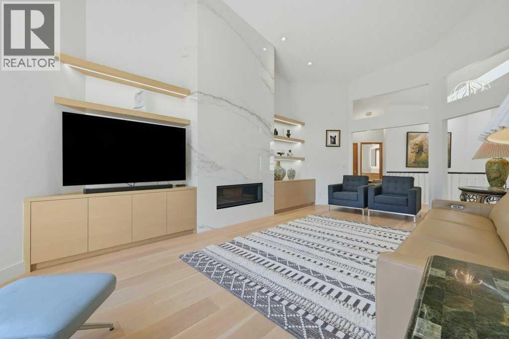 Modern marble feature-wall with low profile gas fireplace