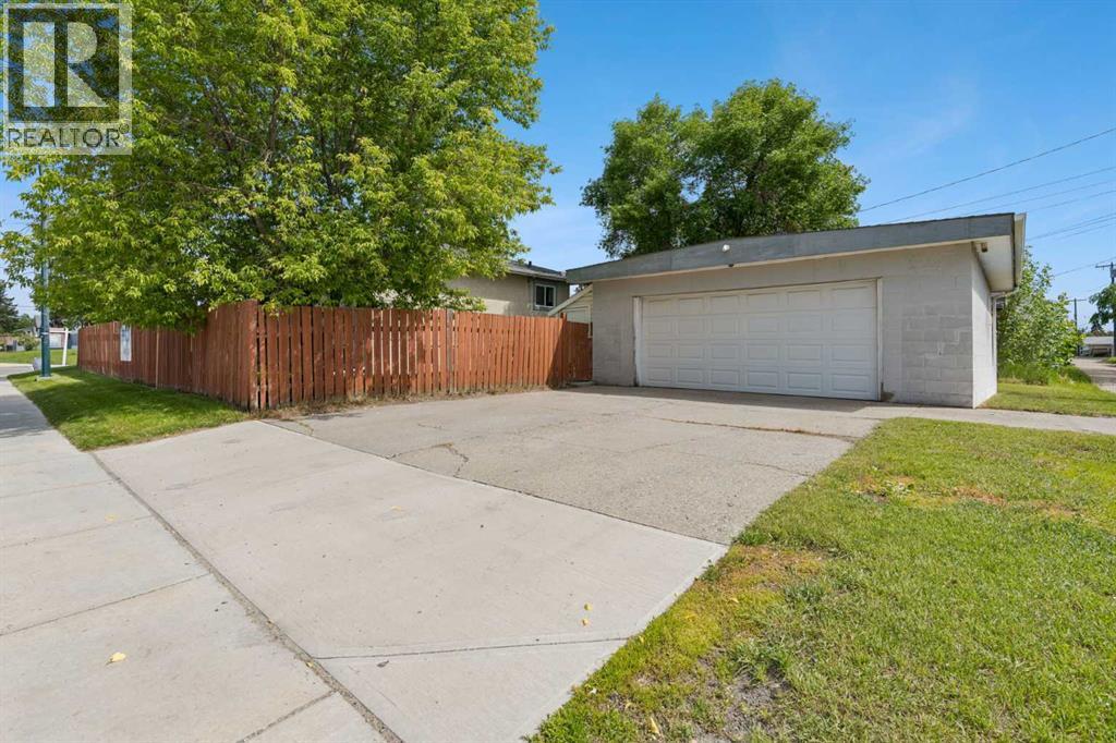 Double detached garage facing the side street
