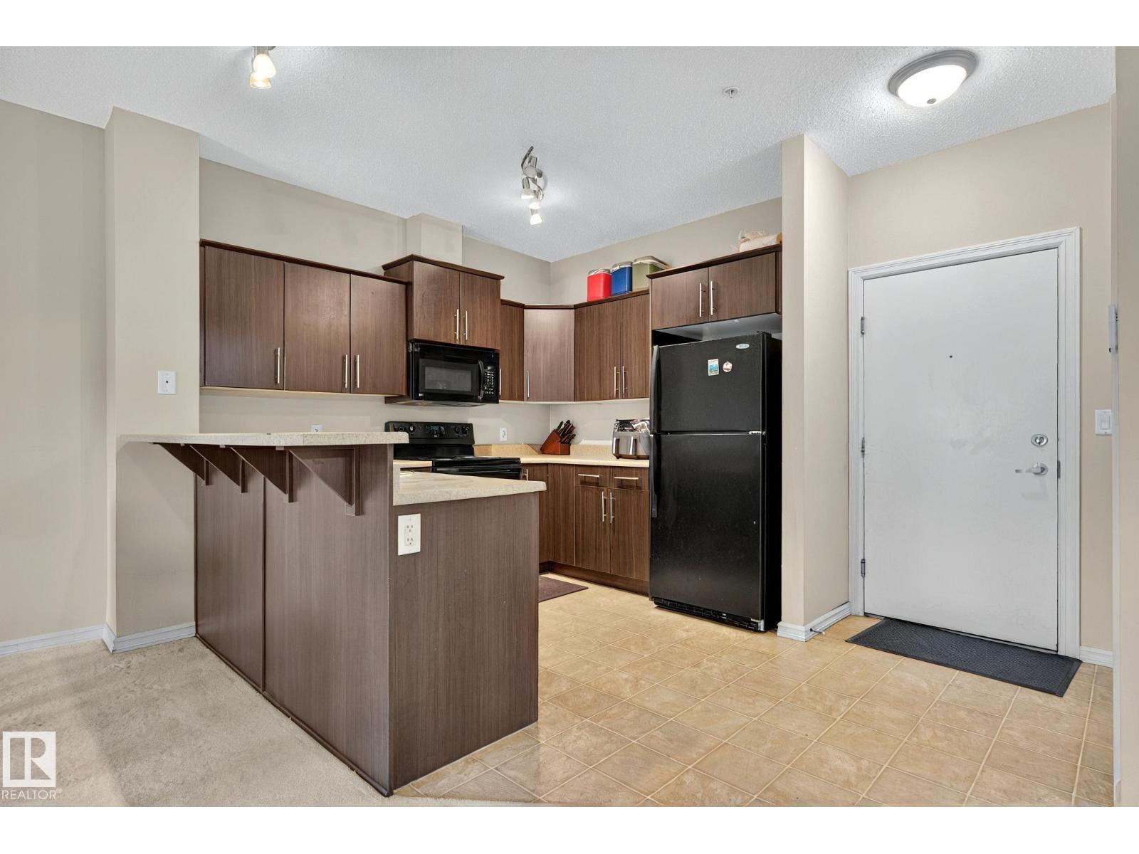 #104 263 MACEWAN RD SW - 23