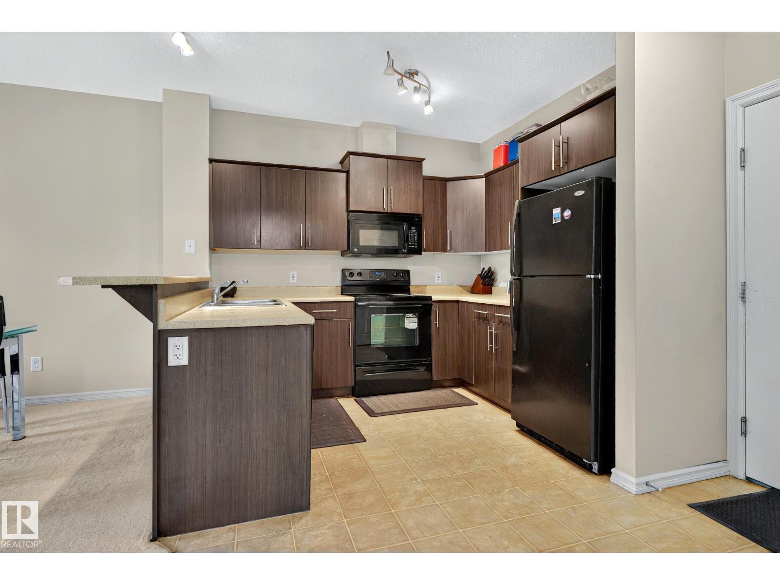 #104 263 MACEWAN RD SW - 24