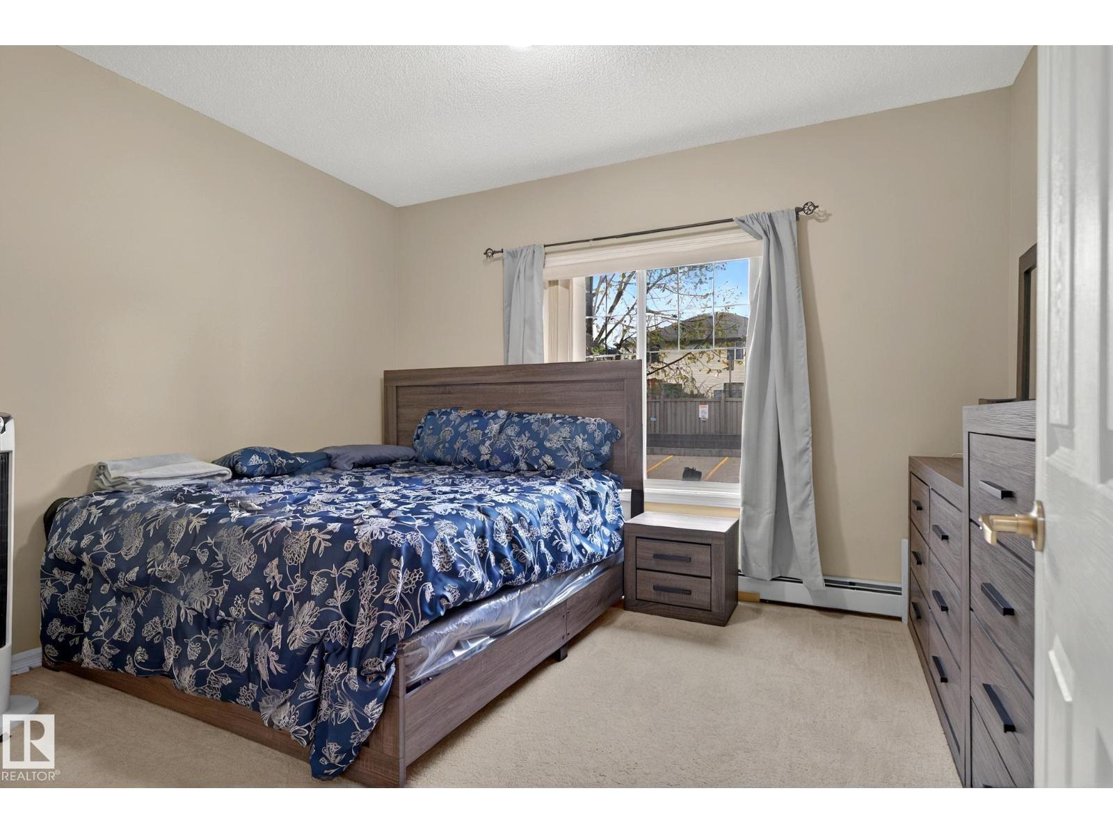 #104 263 MACEWAN RD SW - 32