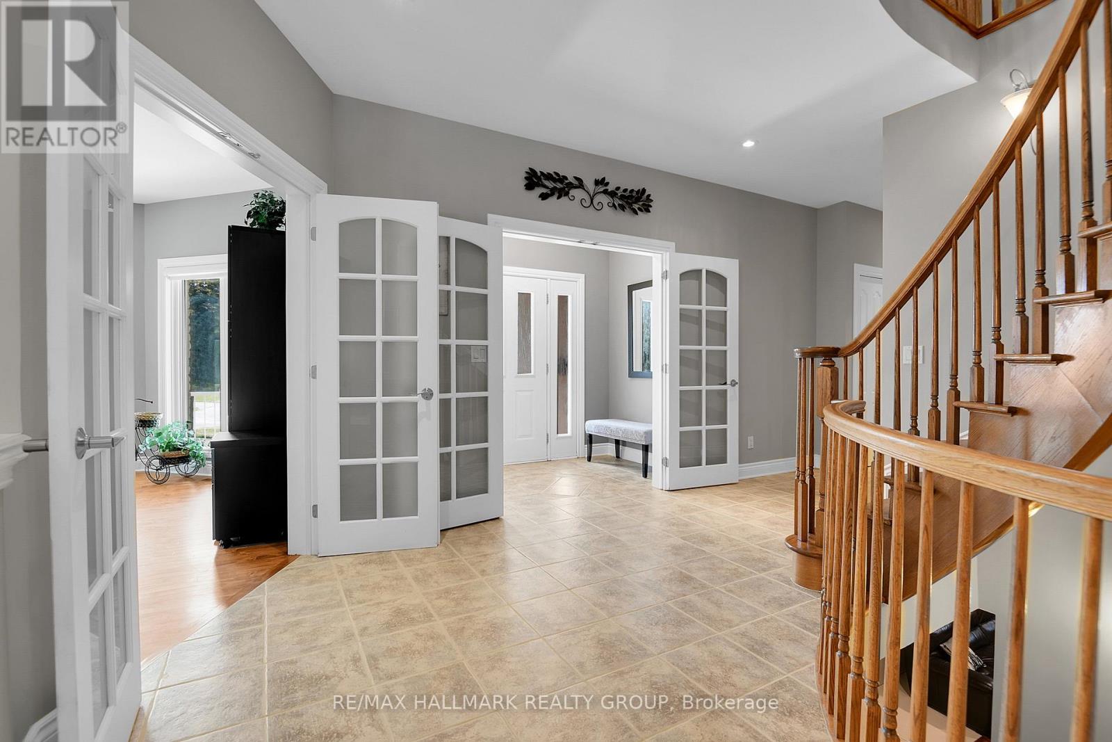FOYER | french doors to vestibule & formal living