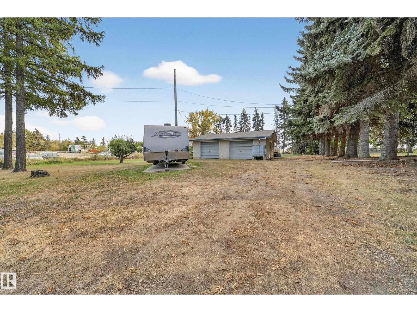 707 65 AV NW - 69