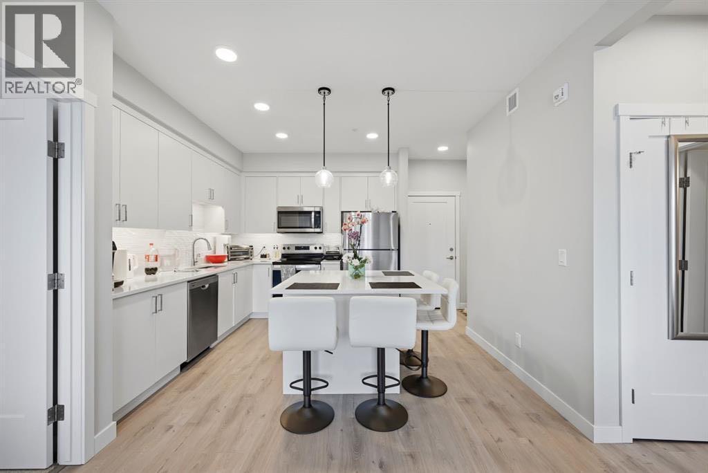 #104 660 Shawnee Square SW - 1