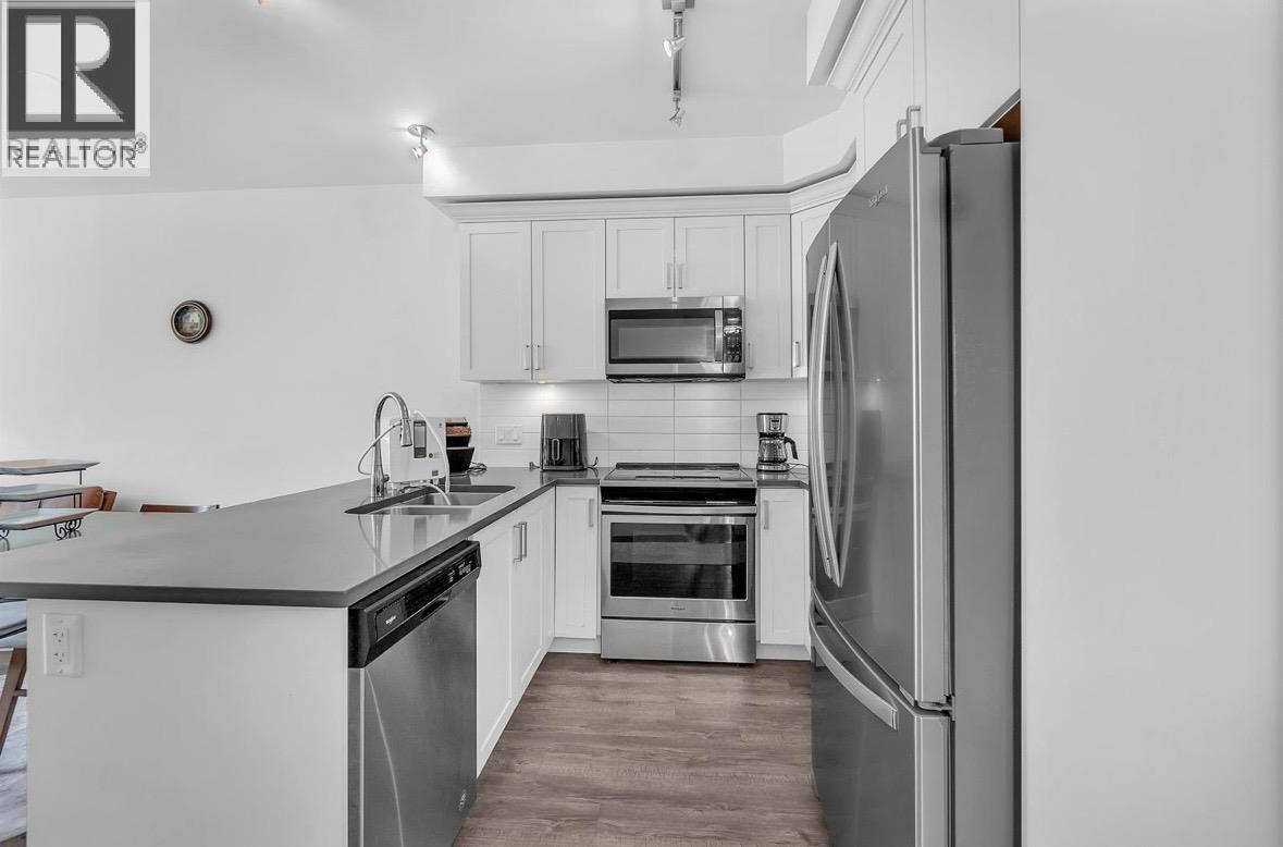 216 2436 KELLY AVE — photo 4