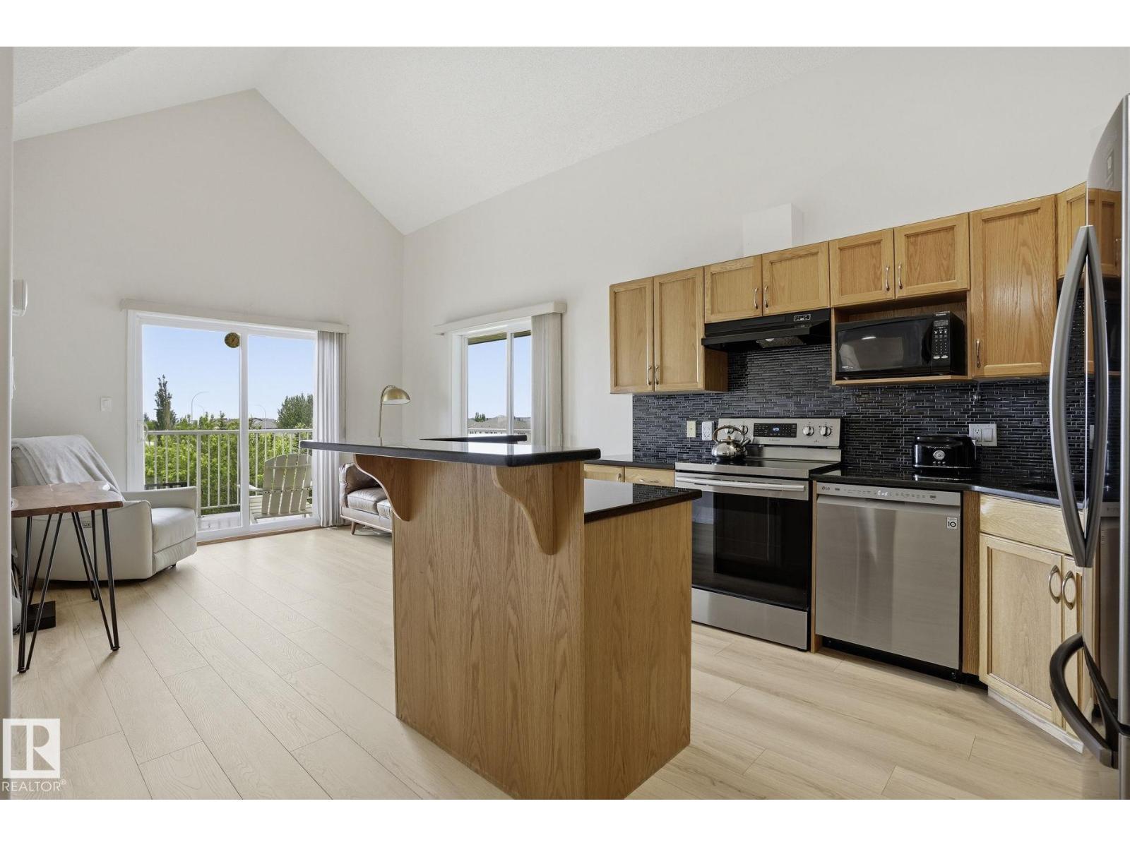 #426 3425 19 ST NW - 4