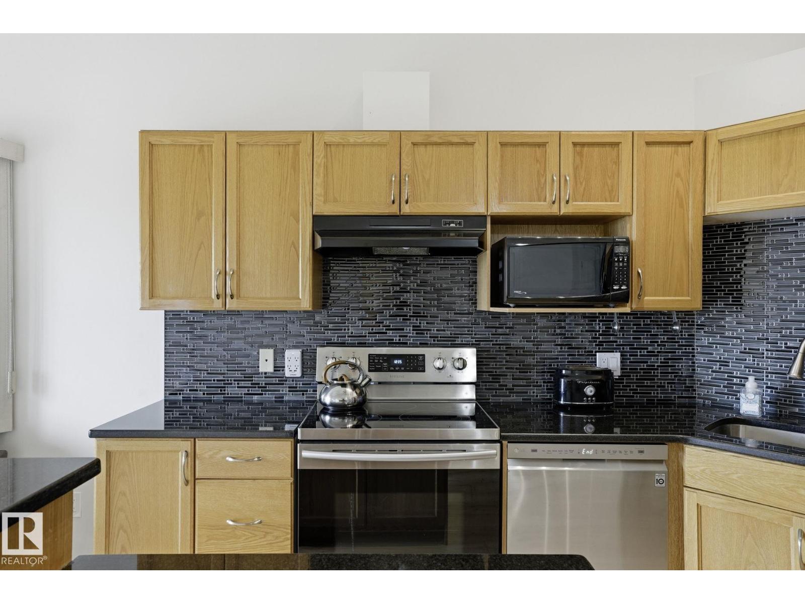 #426 3425 19 ST NW - 6