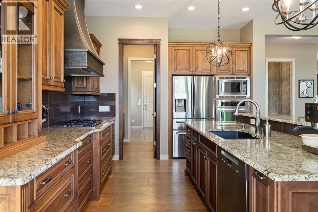 Kitchen, with view to walkthrough pantry