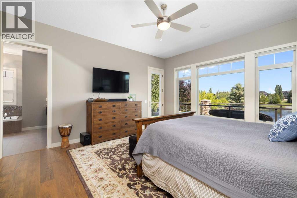 Primary bedroom, with door to back deck