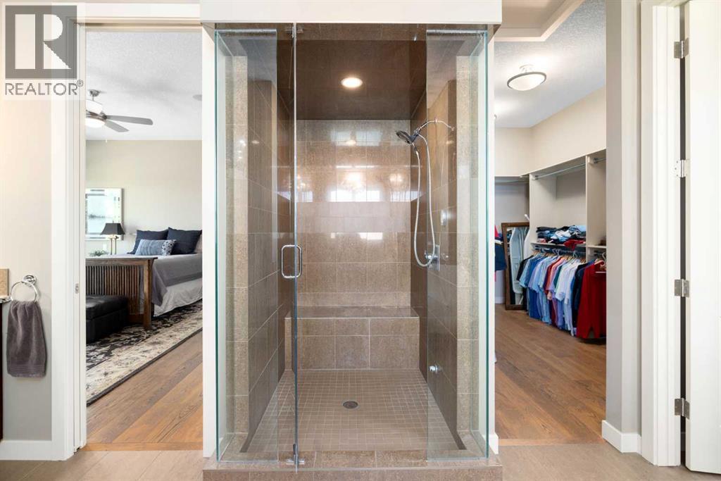 Primary ensuite with view to walk in closet