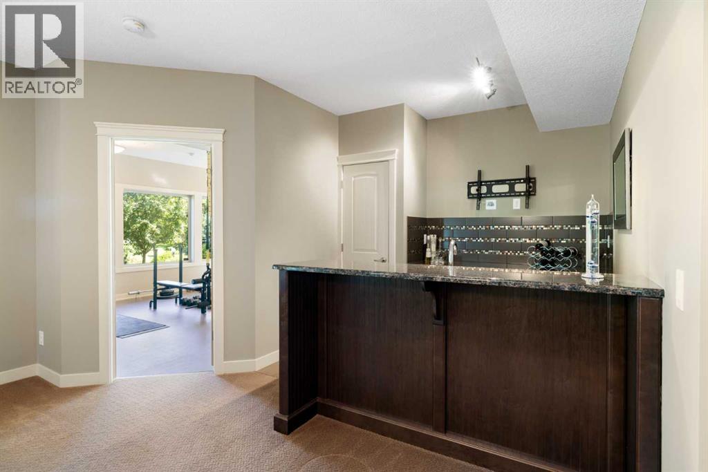 Bar with view to fitness room