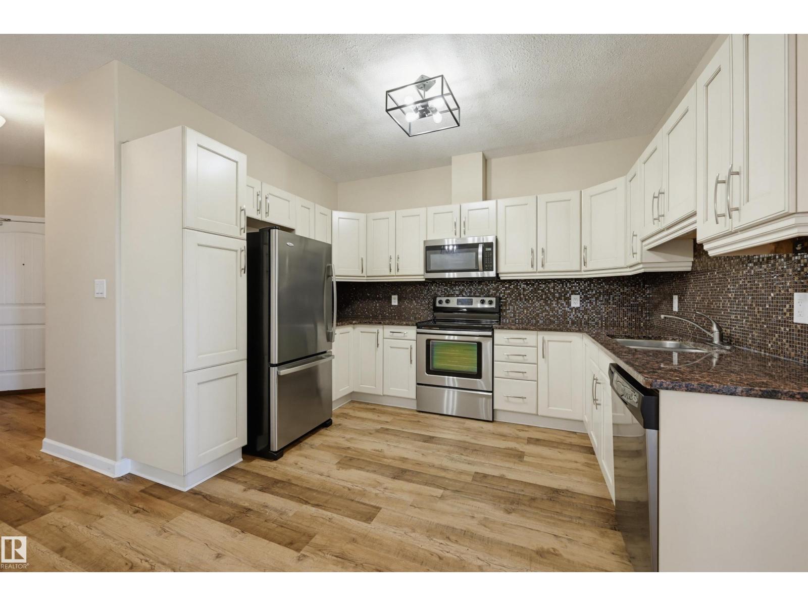 #312 6083 MAYNARD WY NW — photo 11