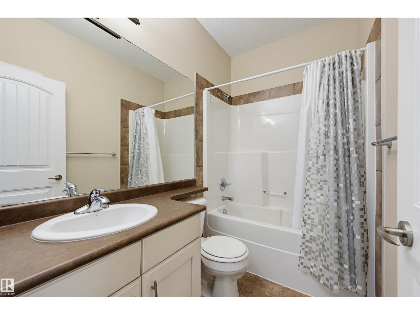 #312 6083 MAYNARD WY NW — photo 20