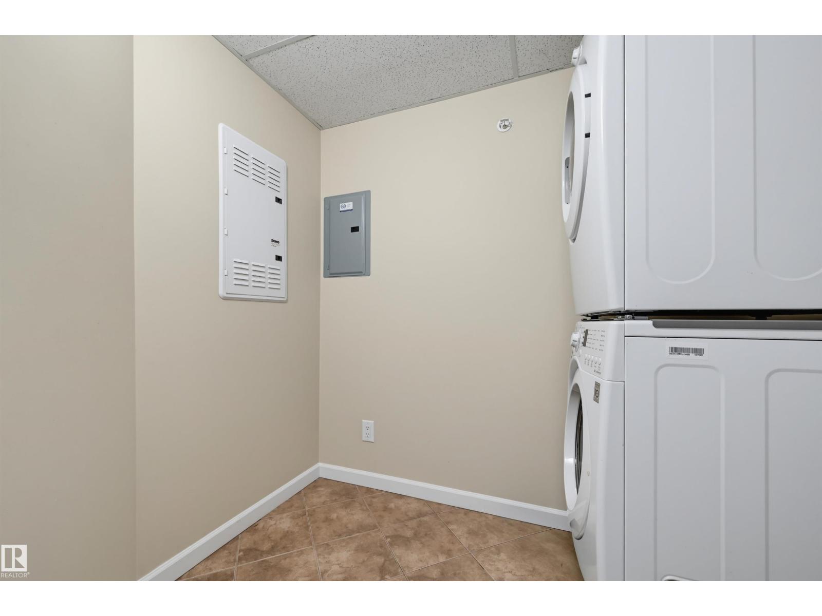 #312 6083 MAYNARD WY NW — photo 23